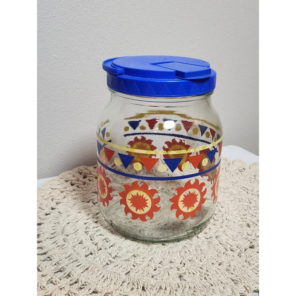 Vintage Glass Sunburst Jar with Blue Flip Top Spout Lid Retro Kitchen Storage
